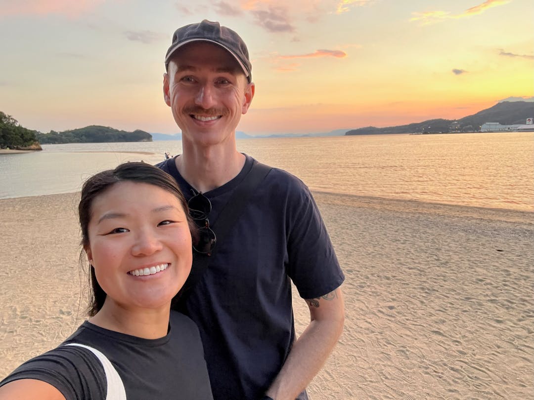 Patrick and Courtney on the beach at sunset in Shodoshima