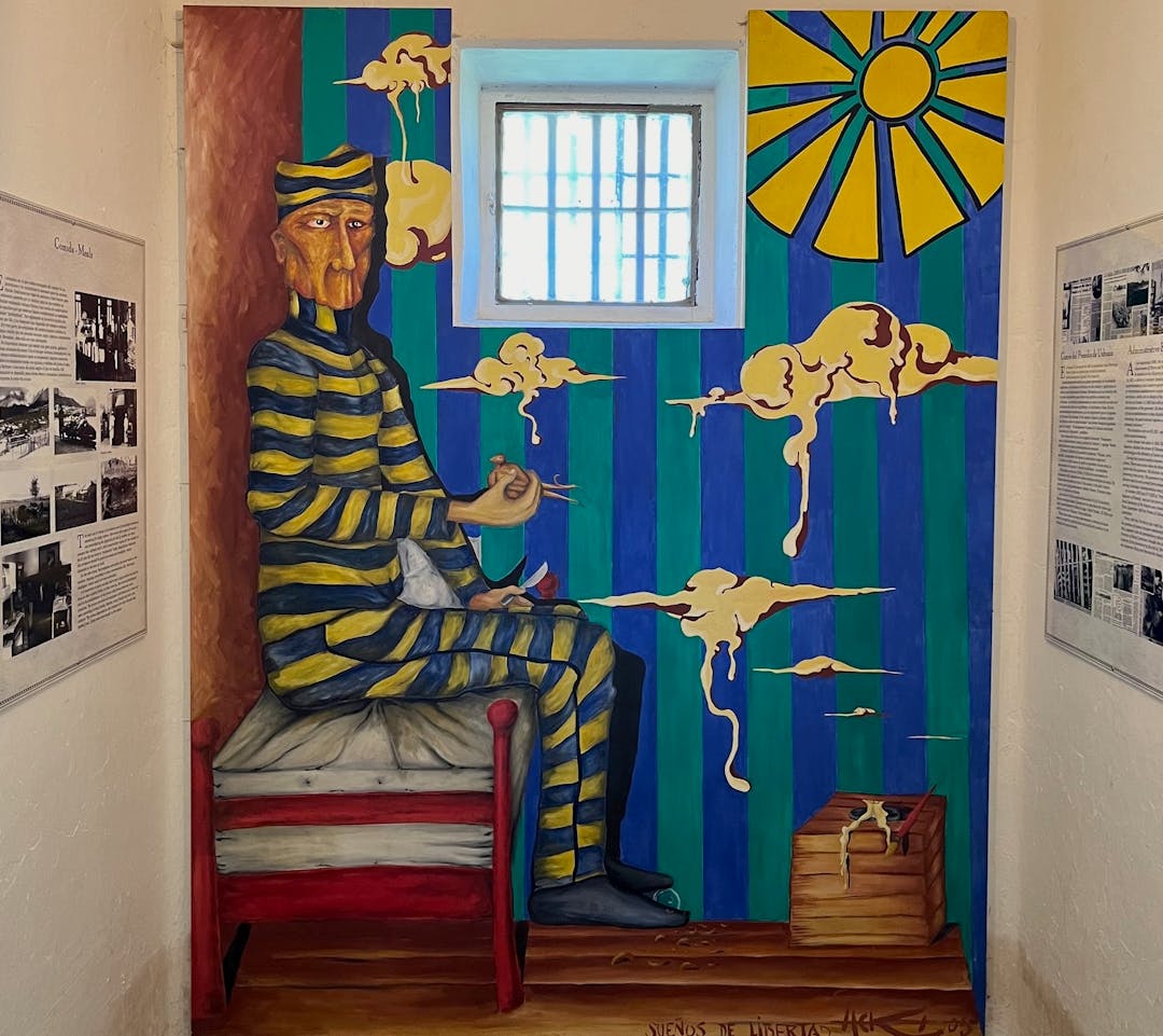 Art in a jail cell in the Ushuaia Maritime and Prison Museum