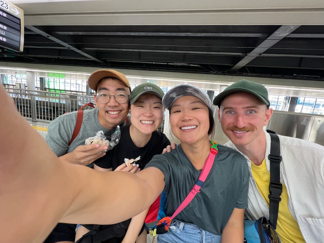 Patrick, Courtney, Brittany, and Jonathan taking a selfie on a train platform